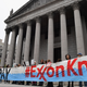 Climate activists protest on the fist day of the ExxonMobil trial outside the New York State Supreme Court building on October 22, 2019 in New York City.